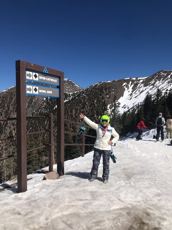 Vera Shury at Black Diamond Spur Catwalk and Bowl Side ski sign